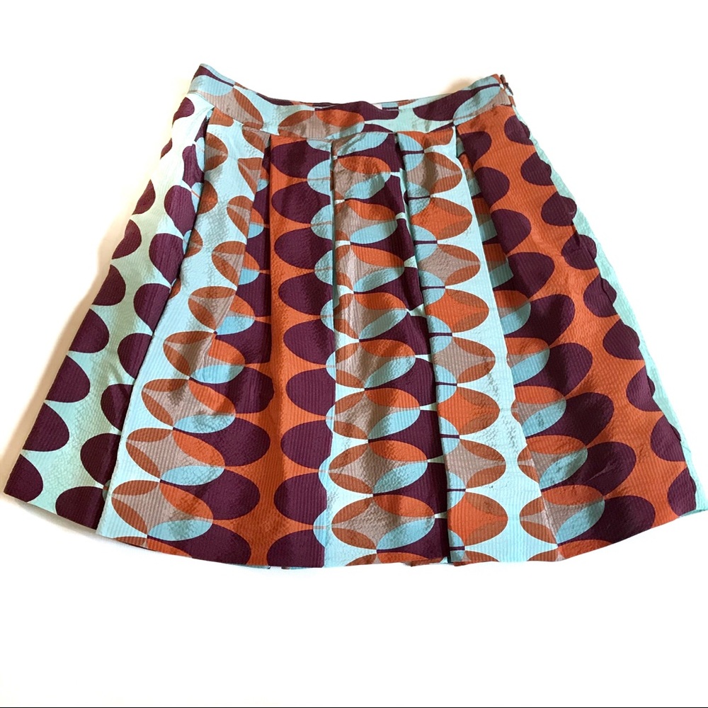 Anthropologie Retro Oval-Print Pleated Skirt in Aqua, Rust & Plum